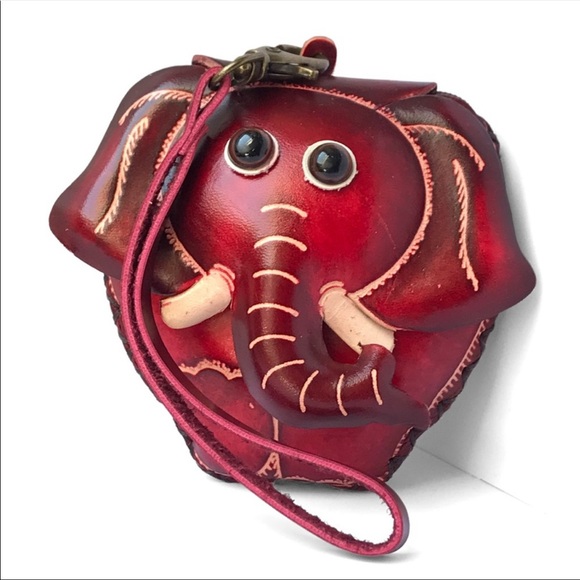 BrambleWood Handbags - 🎉HP 🎉 Genuine leather elephant wristlet